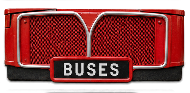 Grille of a classic red London bus with a plate reading BUSES — bus and coach storage